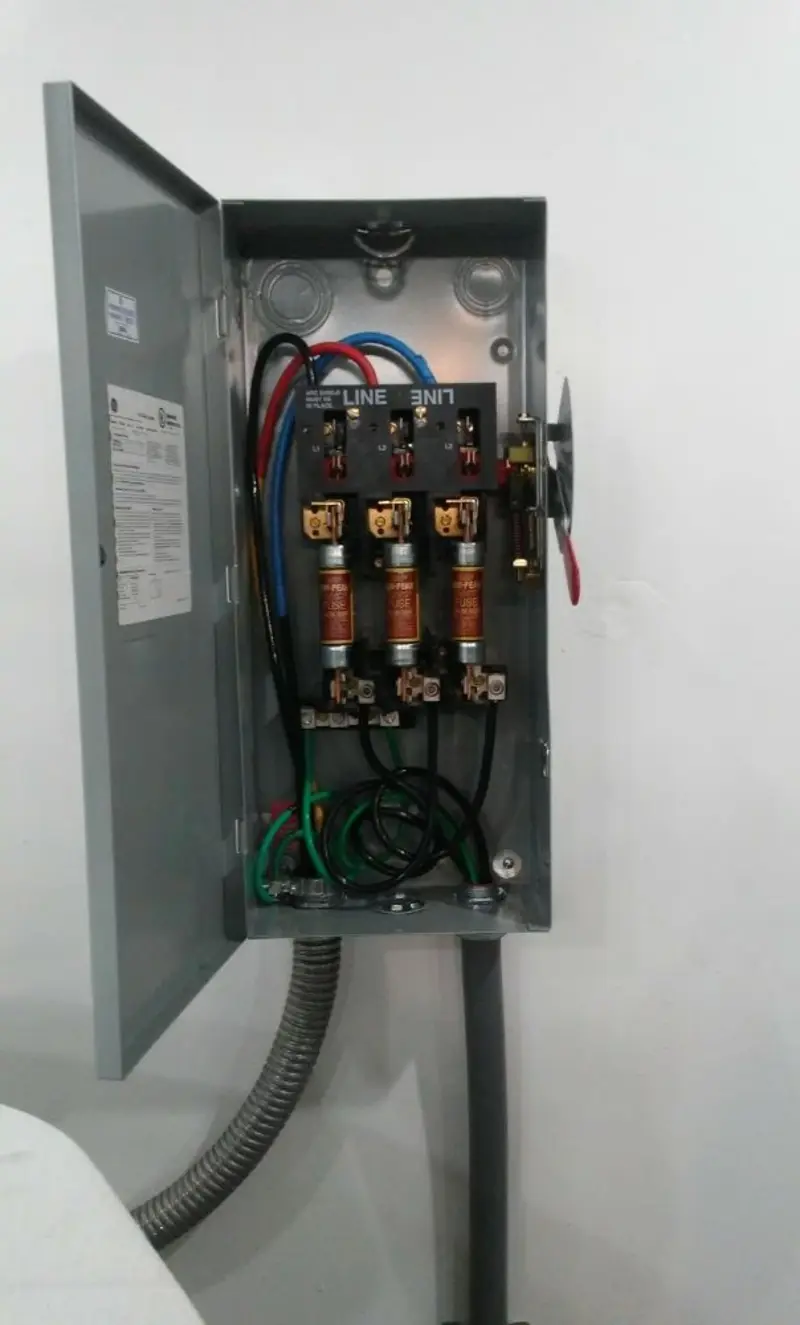 Three-phase disconnect switch installed for Smoke Detector Installation in Cocoa Beach